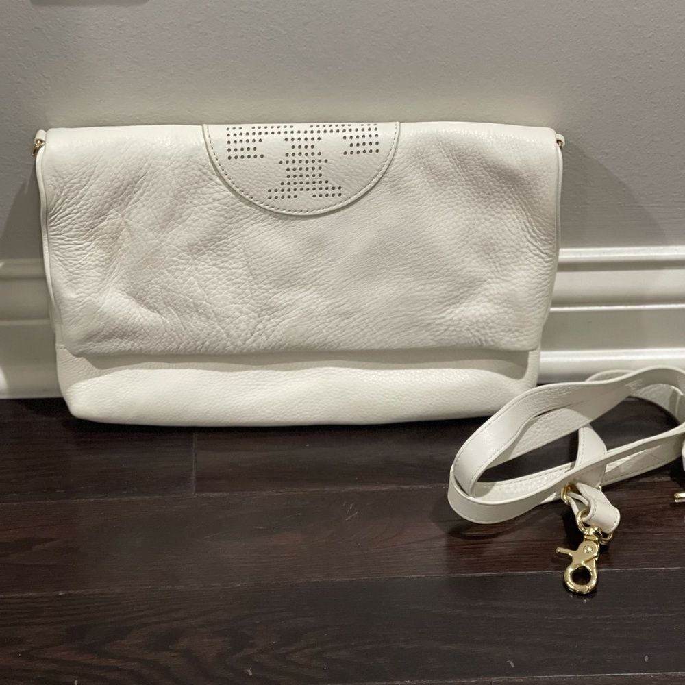 Tory Burch leather handbag/clutch. It’s a white color but a little creamy
